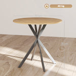Mesa de comedor redonda para 2 personas con tablero efecto madera y base cruzada de acero, blanco roble