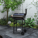 Houtskoolbarbecue trolley, met zijplanken, wielen, deksel, thermometer, schoorsteen, van zwart metaal