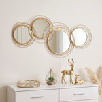 Ensemble de 4 miroirs ronds en métal dorés 107 x 56 cm