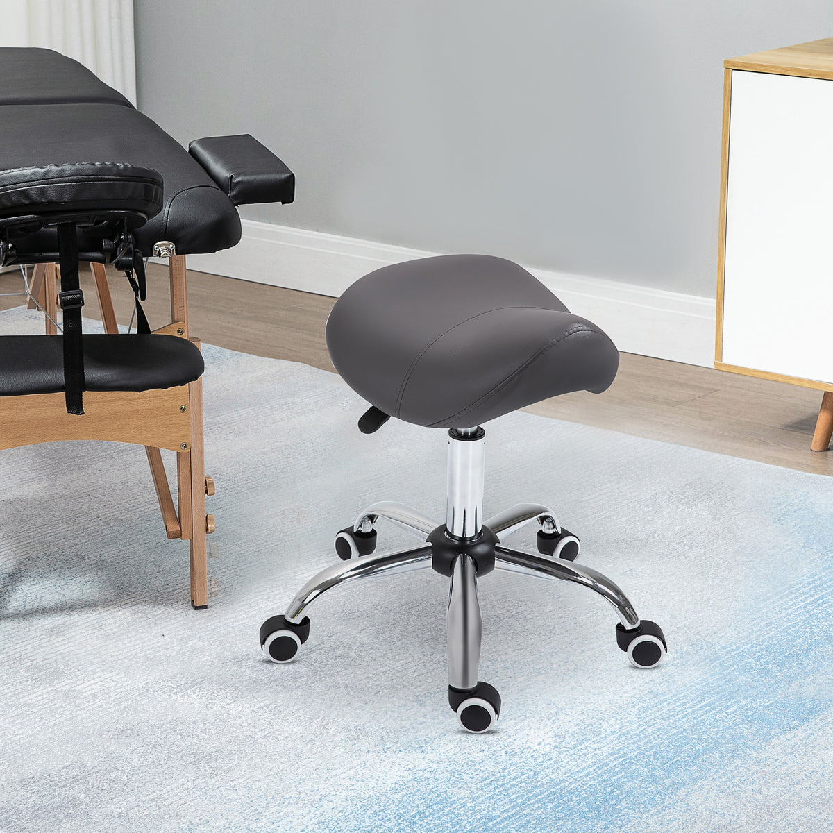 Kruk op wielen, massagekruk met in hoogte verstelbare zitting 49-61 cm en ergonomisch zadel, 360° draaibare werkstoel op wielen, voor massagesalon, tattoostudio, kliniek en spa, grijs