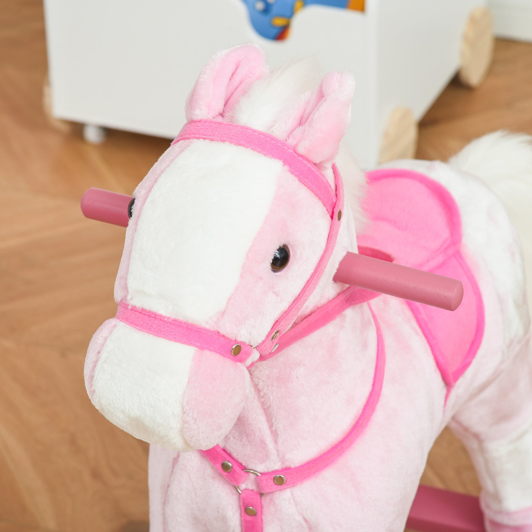 Cheval à Bascule en Bois et Peluche pour Enfant Cheval de Cowboy peluche Pour Enfants de 3-6 Ans Jouet balançoire avec Effet sonore Selle rênes Rose Blanc