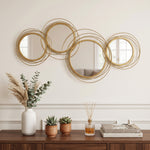 Ensemble de 4 miroirs ronds en métal dorés 107 x 56 cm