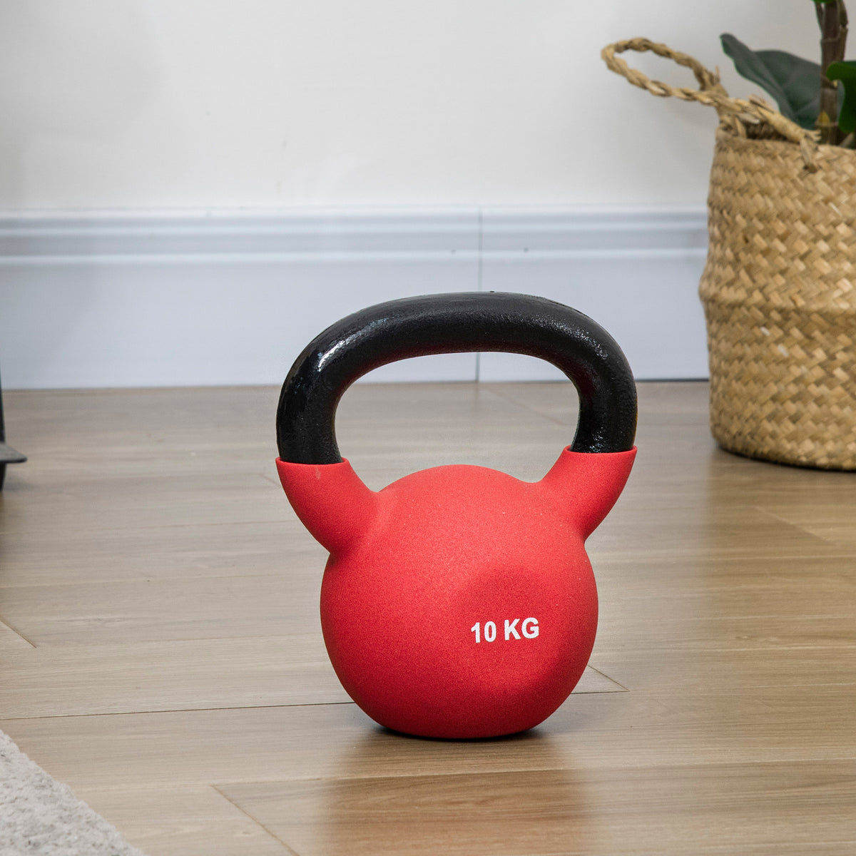 Kettlebell 10 kg en métal poids pour entraînements avec poignée antidérapante et fond plat 19x12x22cm rouge et noir