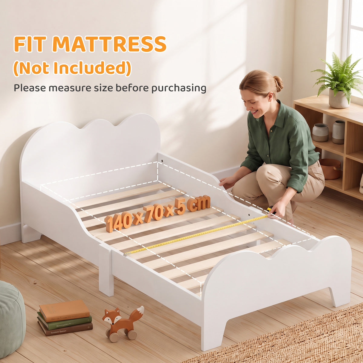 Toddler floor bed 70x140 cm with safety rail, slatted base included, and cloud decorations, white