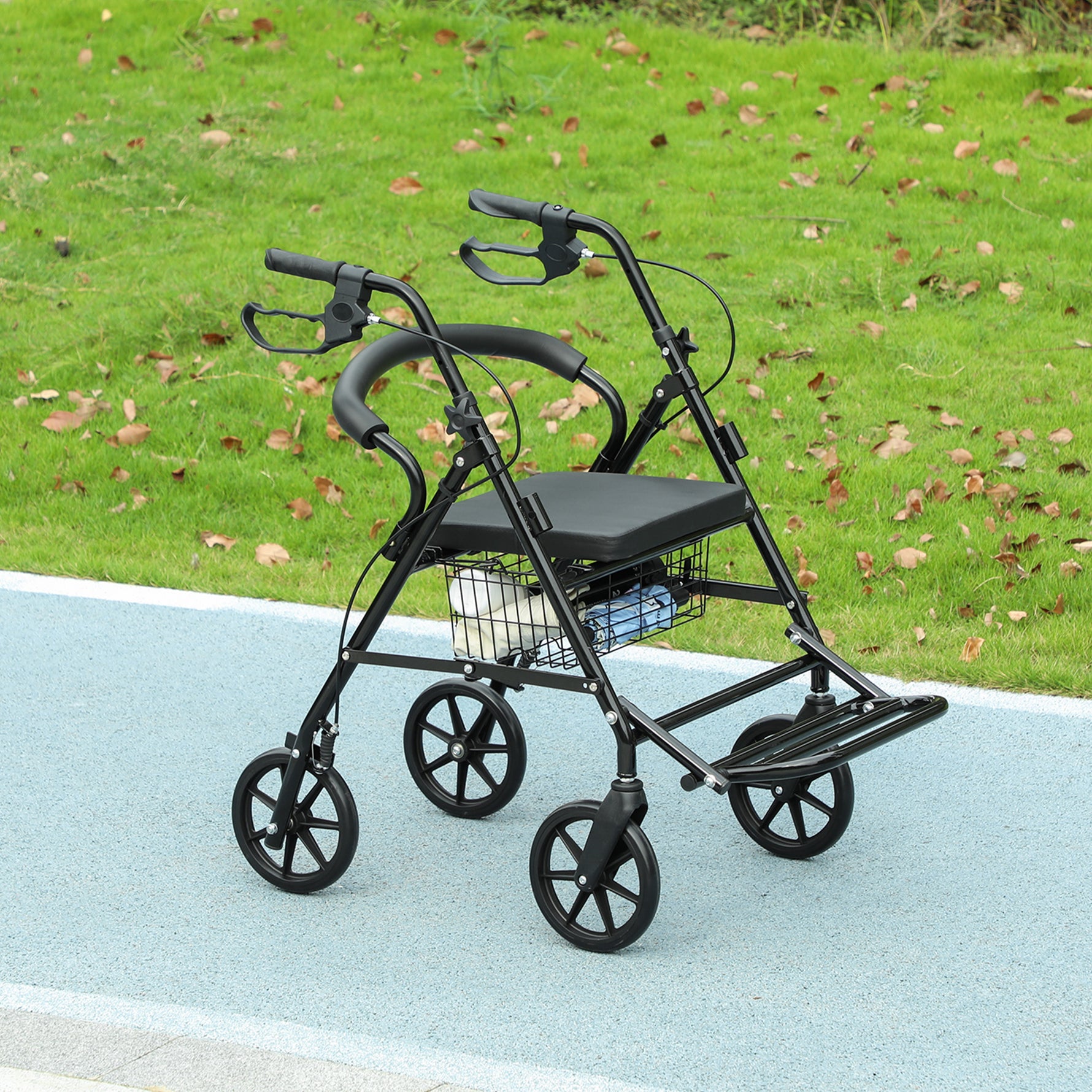 Déambulateur 4 roues - déambulateur pliable léger - assise + dossier rembourré - poignées ergonomiques, freins à main - panier rangement - cale-pied - métal noir