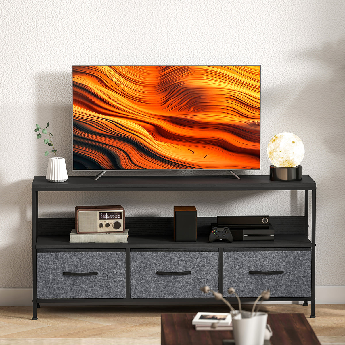 Meuble TV, meuble télé pour téléviseur jusqu'à 55 pouces avec 3 tiroirs et pieds en acier 120 x 29 x 56 cm noir